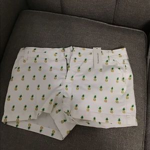 A pair of blue rain shorts.